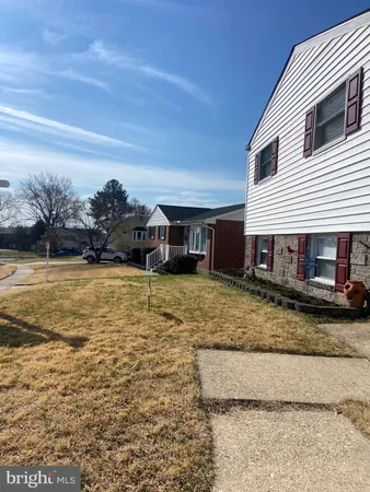 a view of large yard with a road