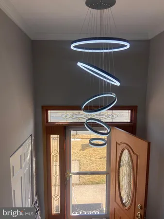 a kitchen with stainless steel appliances granite countertop a stove a refrigerator and a sink