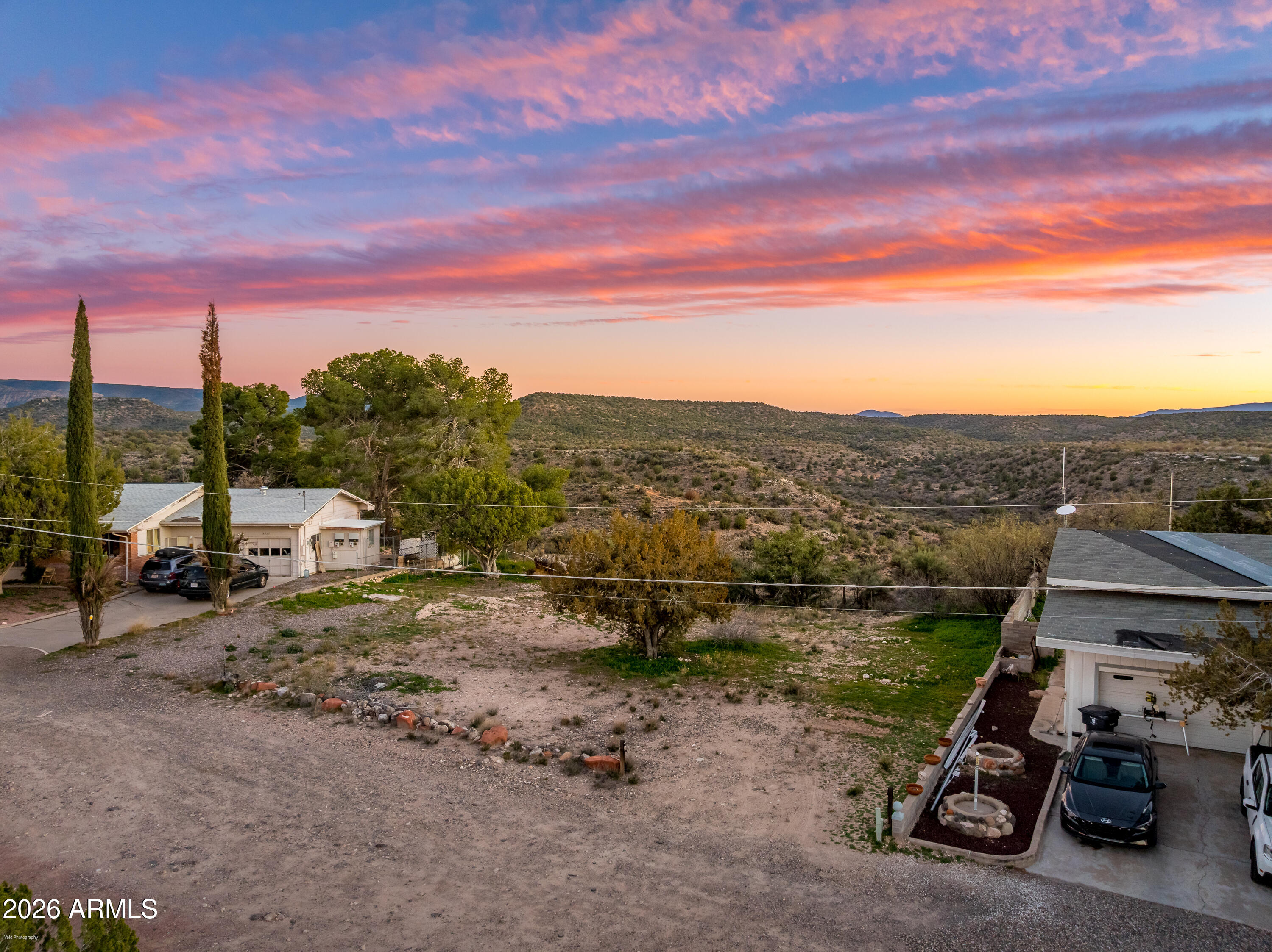 4015 North Pine Drive, Unit 270 Rimrock, AZ 86335 - Photo 1 of 24 a view of a lake with a car parked in the background