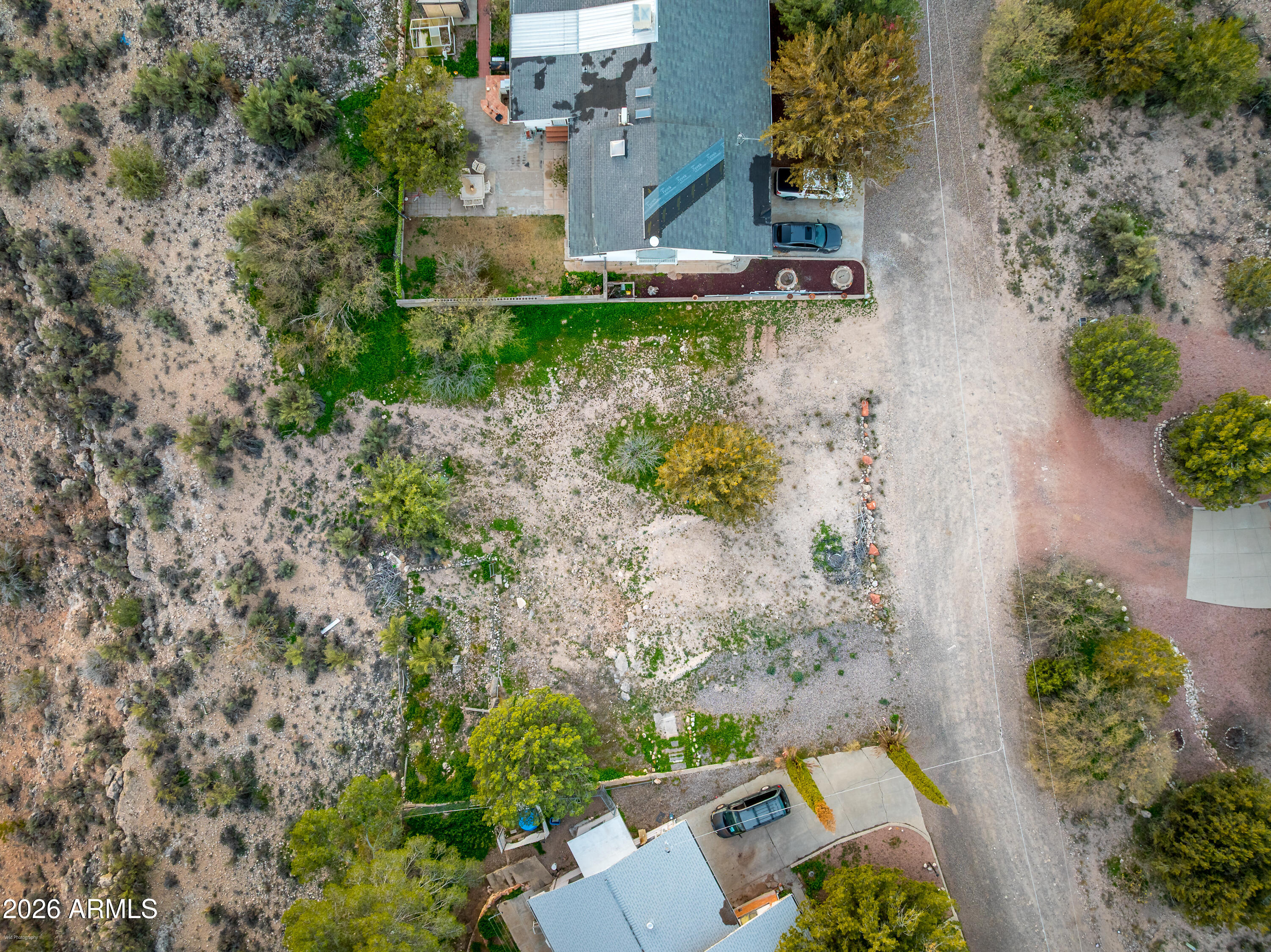 4015 North Pine Drive, Unit 270 Rimrock, AZ 86335 - Photo 16 of 24 an aerial view of a house with a yard and large trees
