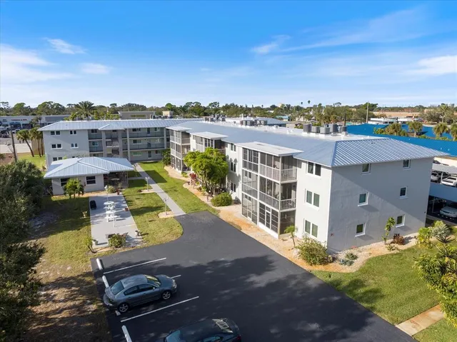 an aerial view of a house with a garden