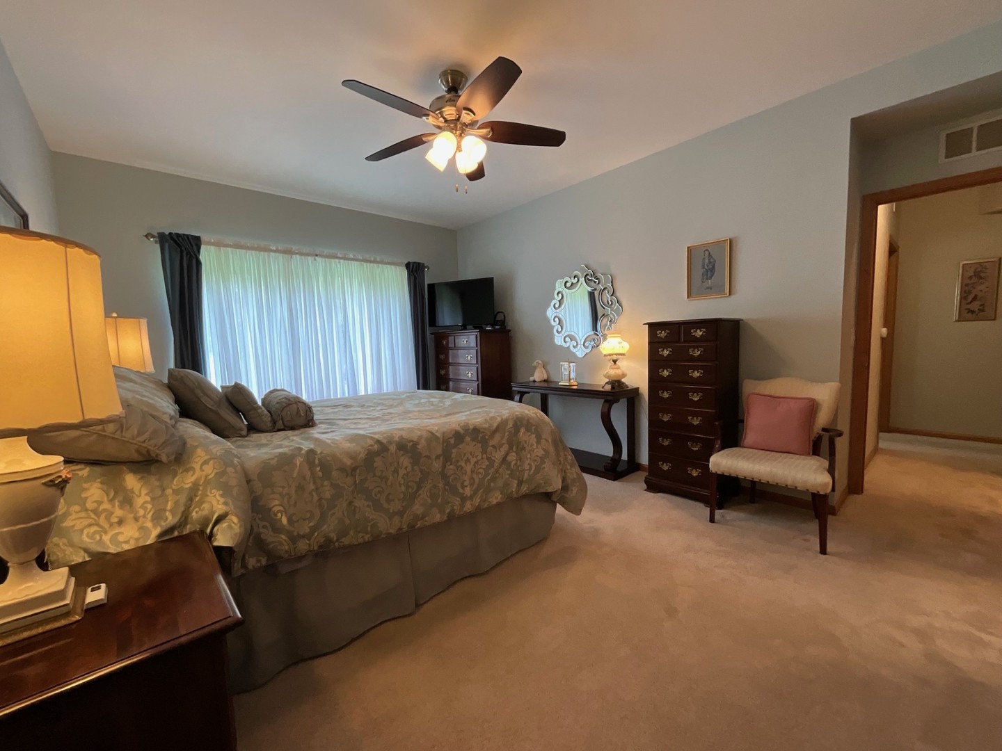 832 Coronado Court, Unit 832 Elgin, IL 60123 - Photo 11 of 20 a spacious bedroom with a bed a couch and dresser