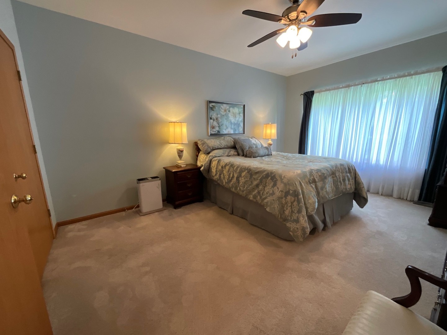 832 Coronado Court, Unit 832 Elgin, IL 60123 - Photo 12 of 20 a bedroom with a bed and window