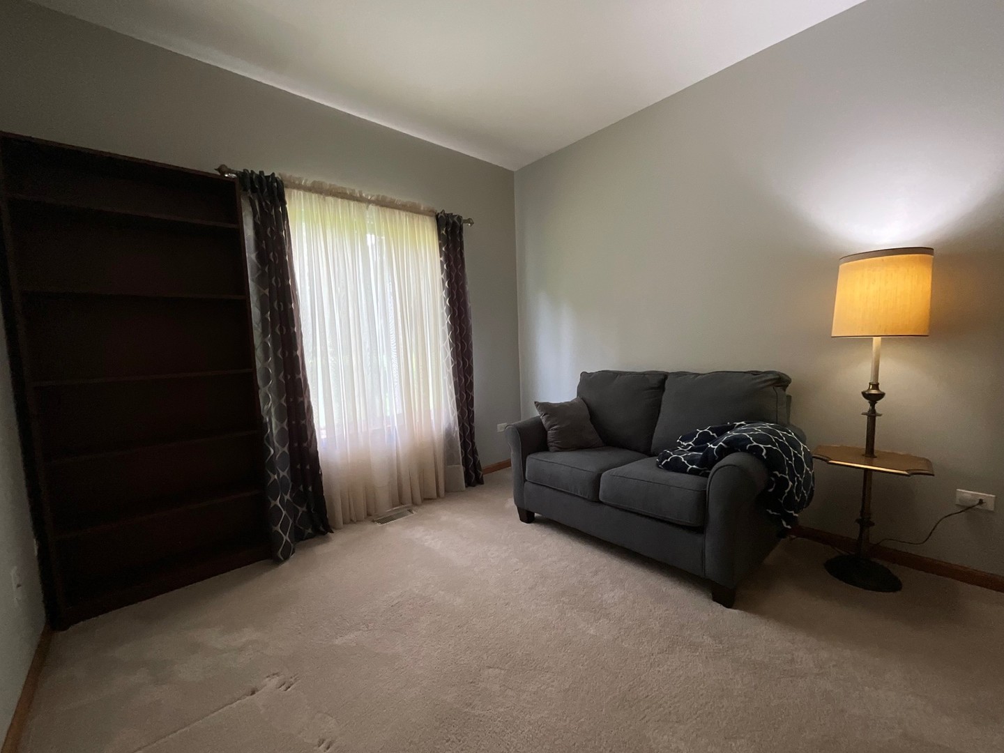 832 Coronado Court, Unit 832 Elgin, IL 60123 - Photo 15 of 20 a living room with furniture and a window