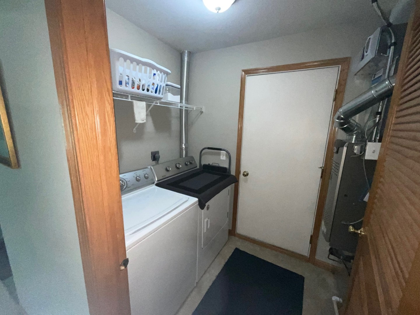832 Coronado Court, Unit 832 Elgin, IL 60123 - Photo 17 of 20 a utility room with dryer and washer