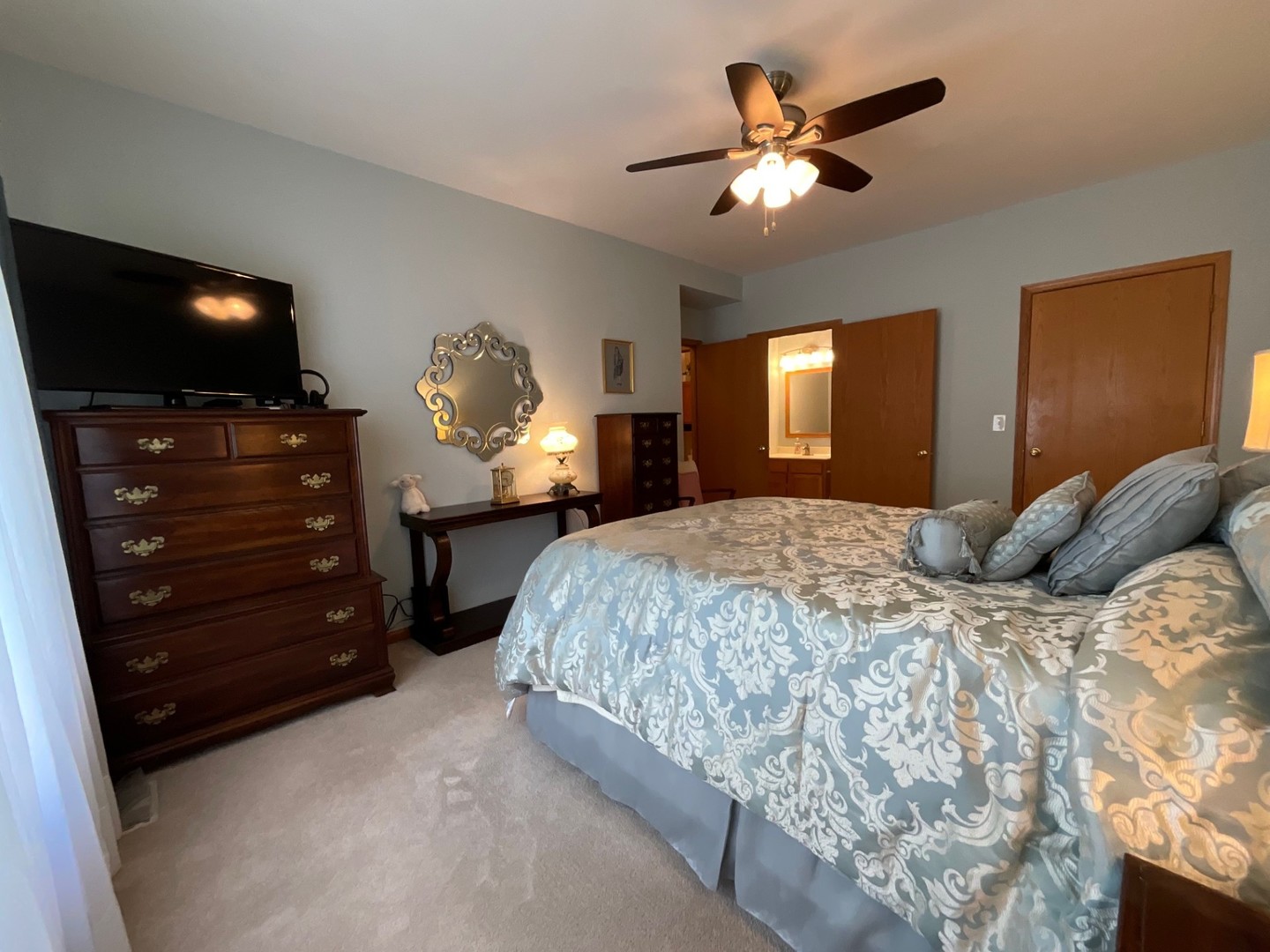 832 Coronado Court, Unit 832 Elgin, IL 60123 - Photo 10 of 20 a bed room with a bed and a television