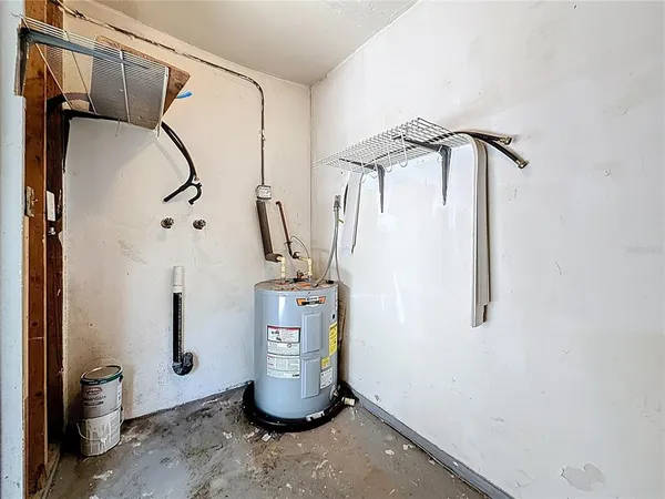 a view of an empty room with windows