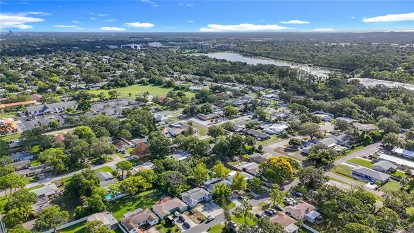 a view of city and green space