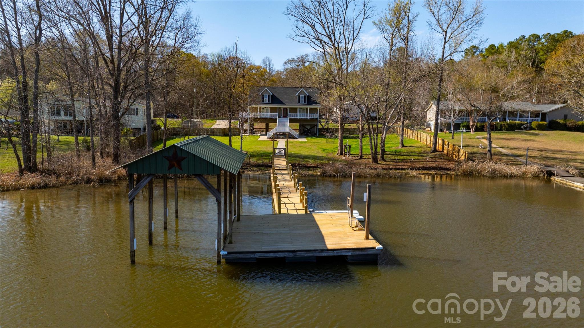 1273 State Rd S-20-317 Winnsboro, SC 29180 - Photo 11 of 48 a view of a lake with houses