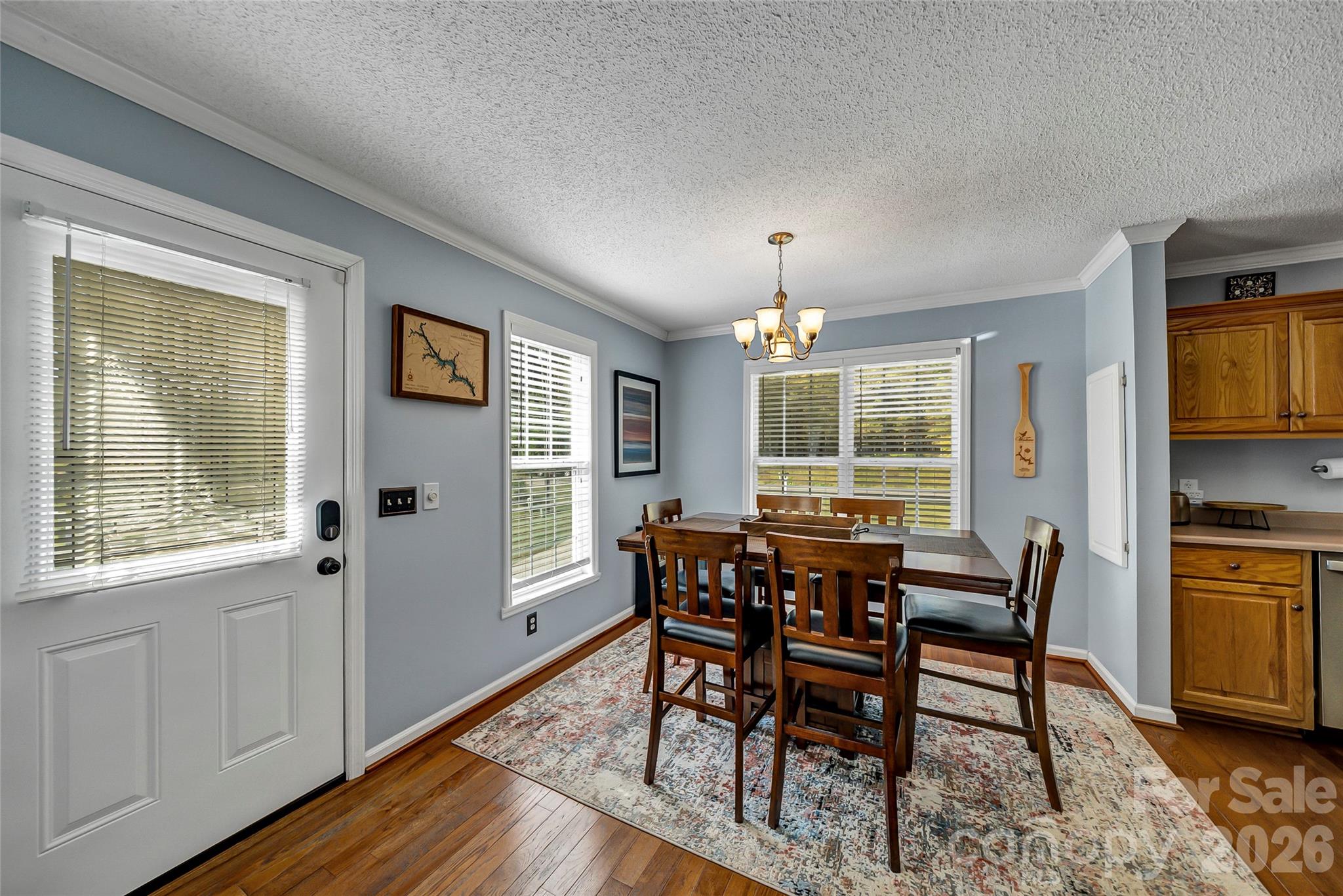 1273 State Rd S-20-317 Winnsboro, SC 29180 - Photo 15 of 48 a view of a dining room with furniture window and wooden floor