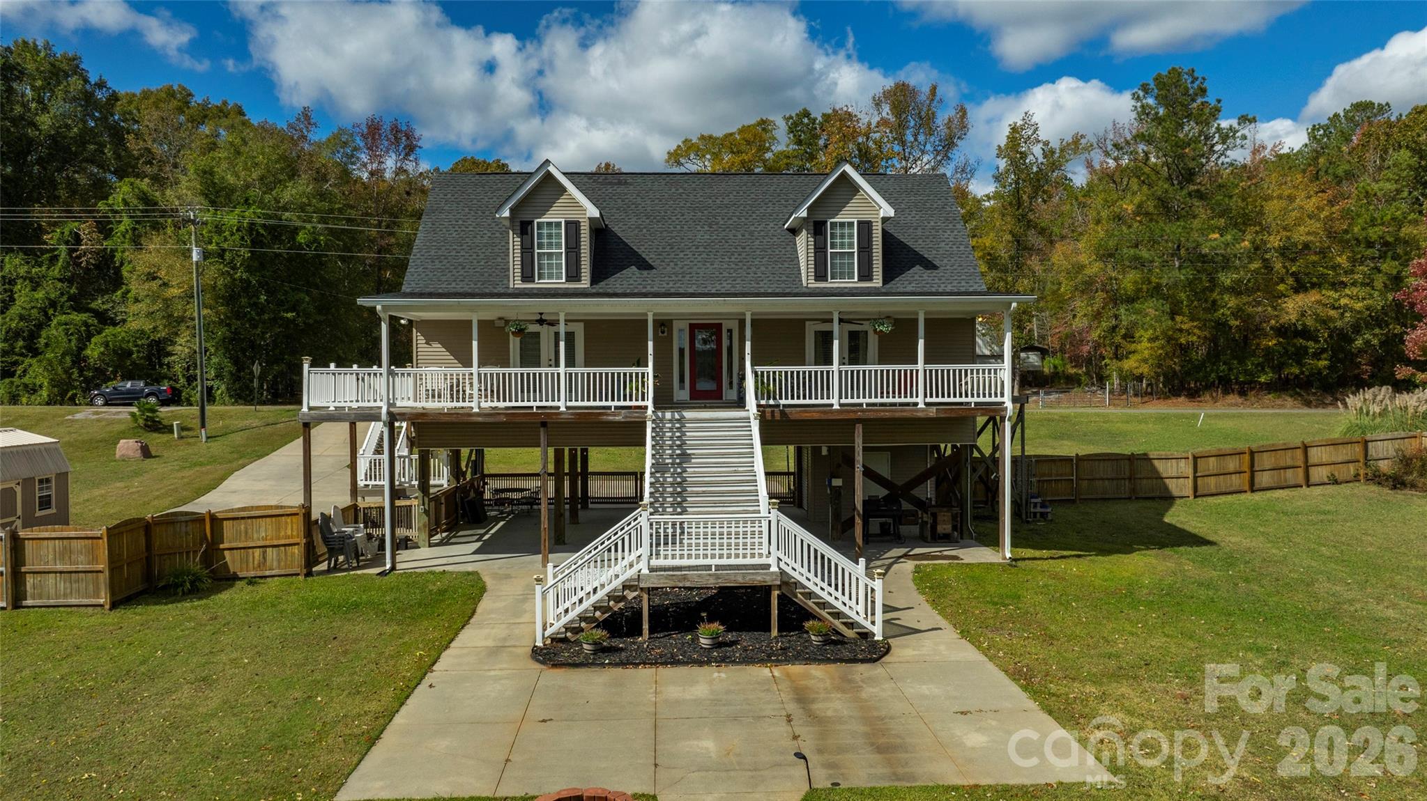 1273 State Rd S-20-317 Winnsboro, SC 29180 - Photo 2 of 48 a front view of a house with a yard