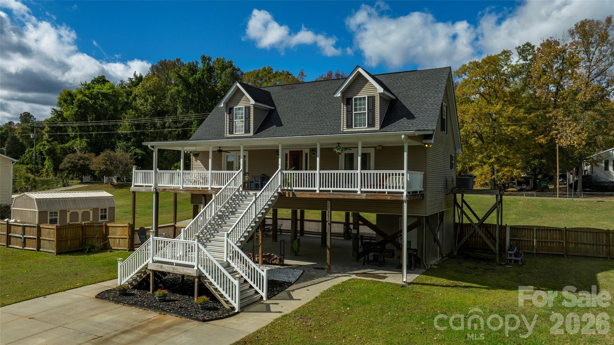 1273 State Rd S-20-317 Winnsboro, SC 29180 - Photo 3 of 48 a view of a house with a yard patio and slide
