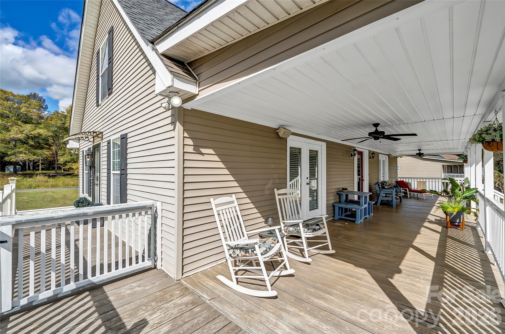 1273 State Rd S-20-317 Winnsboro, SC 29180 - Photo 43 of 48 a view of a patio with table and chairs and a barbeque