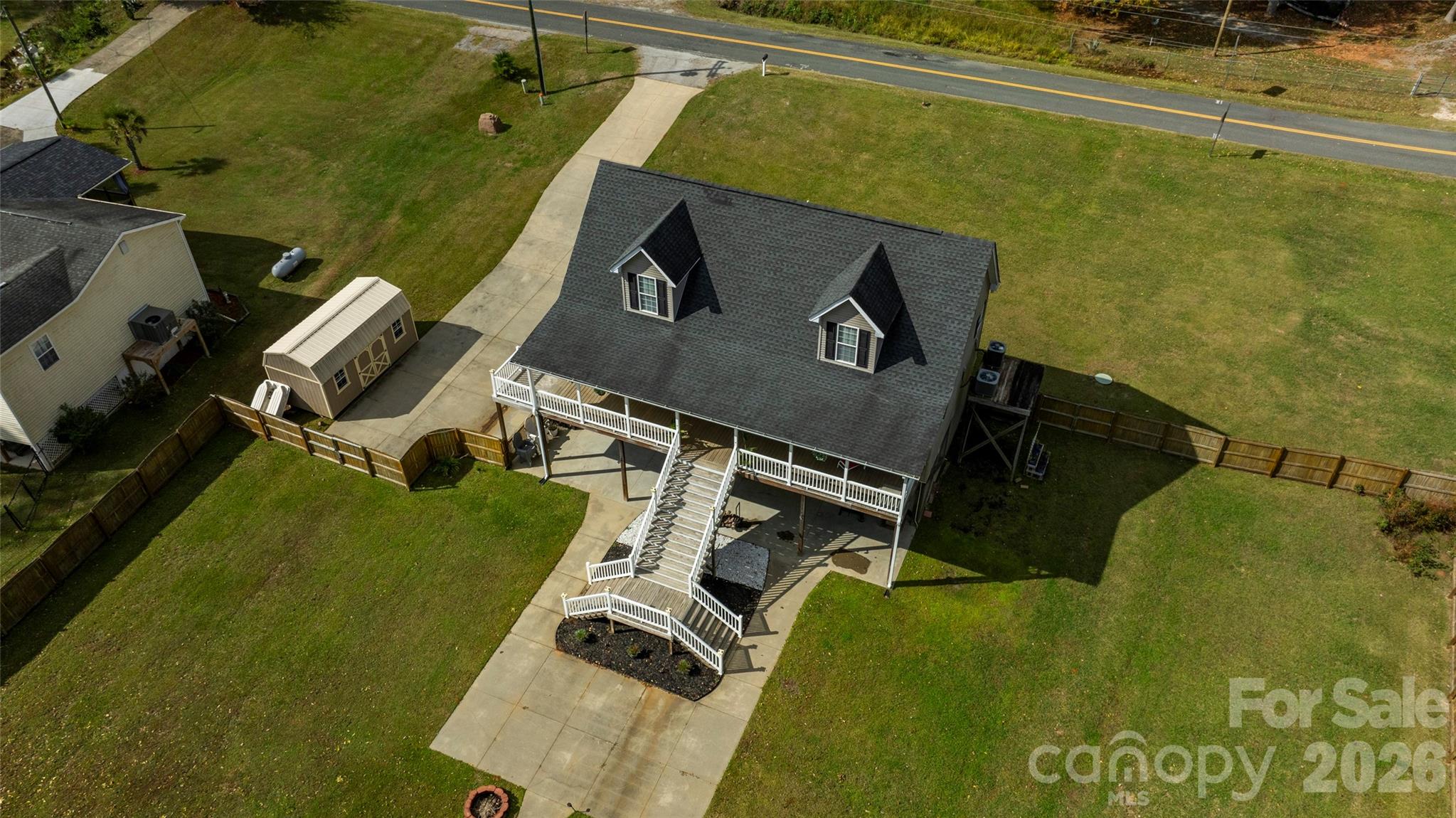1273 State Rd S-20-317 Winnsboro, SC 29180 - Photo 5 of 48 an aerial view of a house with outdoor space