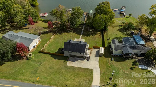 an aerial view of a house with a garden