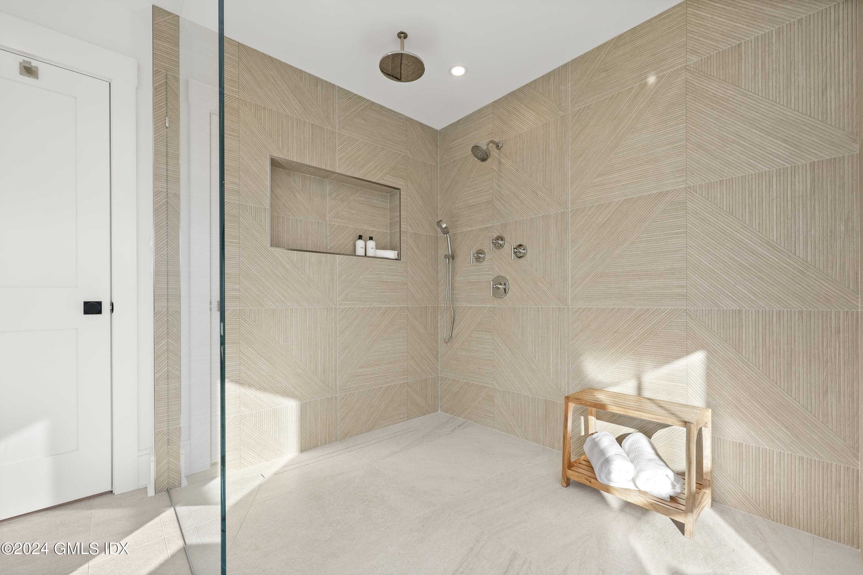 5 Northridge Road Old Greenwich, CT 06870 - Photo 12 of 32 a bathroom with a bathtub and a shower