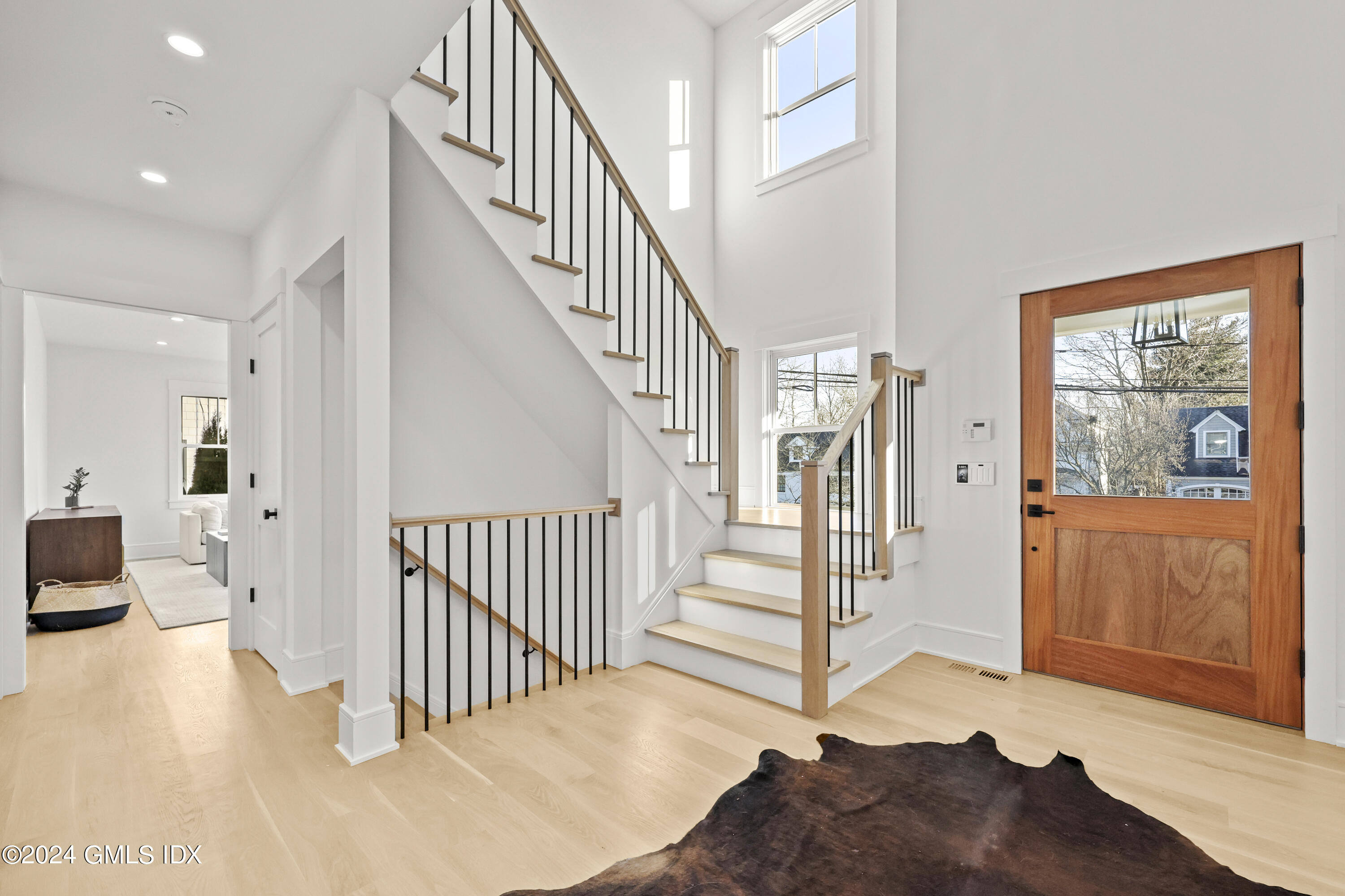 5 Northridge Road Old Greenwich, CT 06870 - Photo 2 of 32 a view of entryway with wooden floor and windows