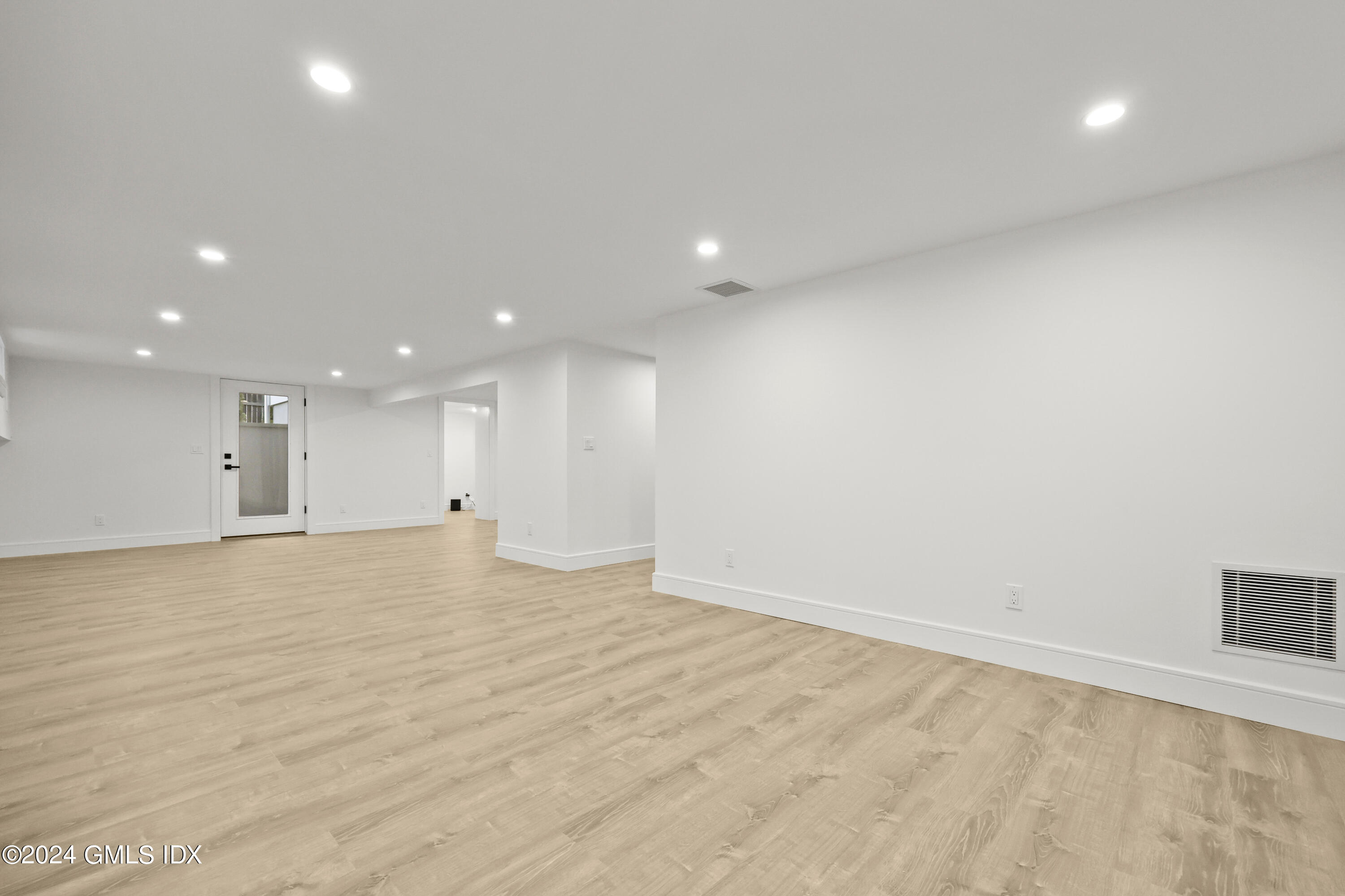 5 Northridge Road Old Greenwich, CT 06870 - Photo 25 of 32 a view of an empty room with wooden floor