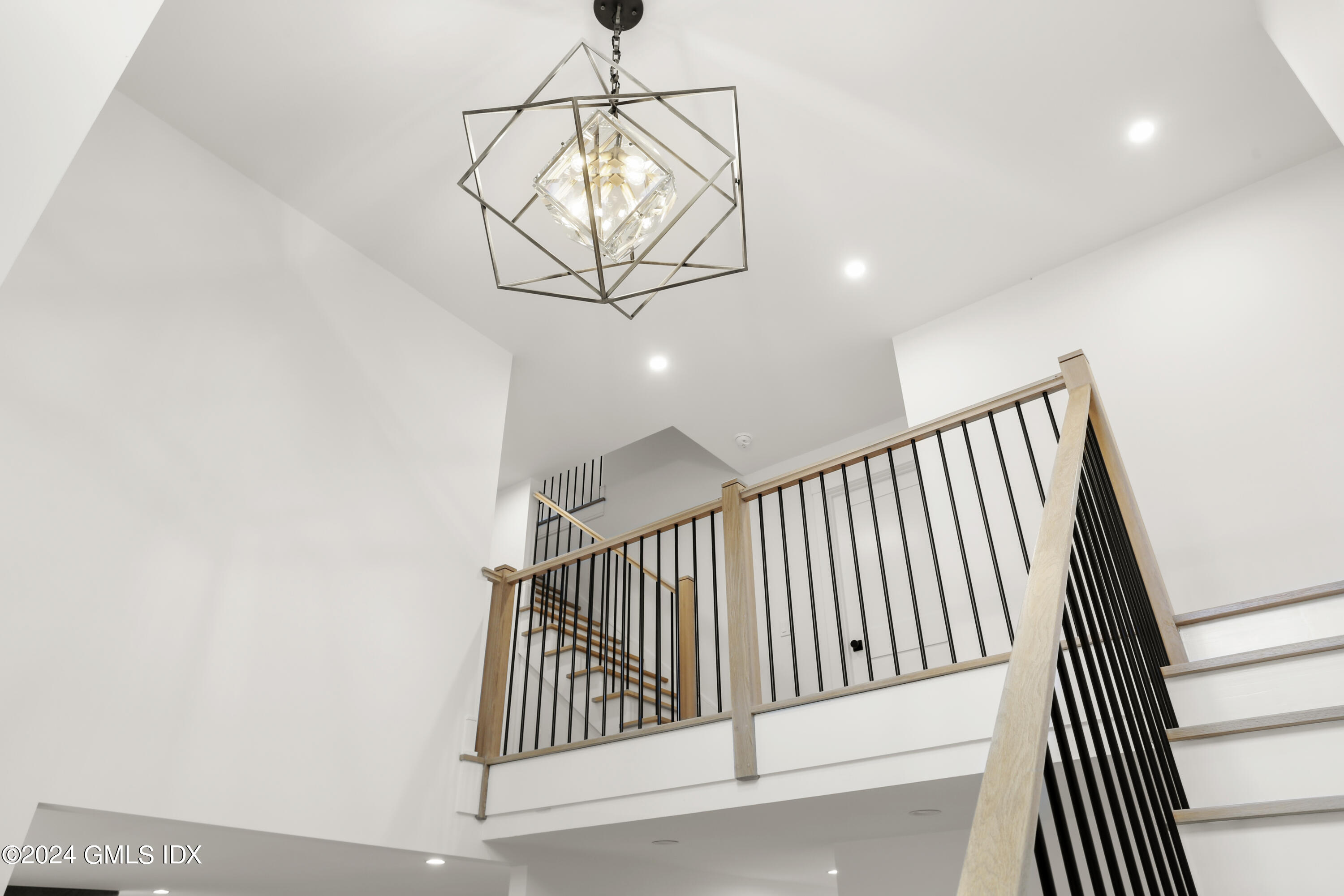 5 Northridge Road Old Greenwich, CT 06870 - Photo 26 of 32 a view of staircase with railing and white walls