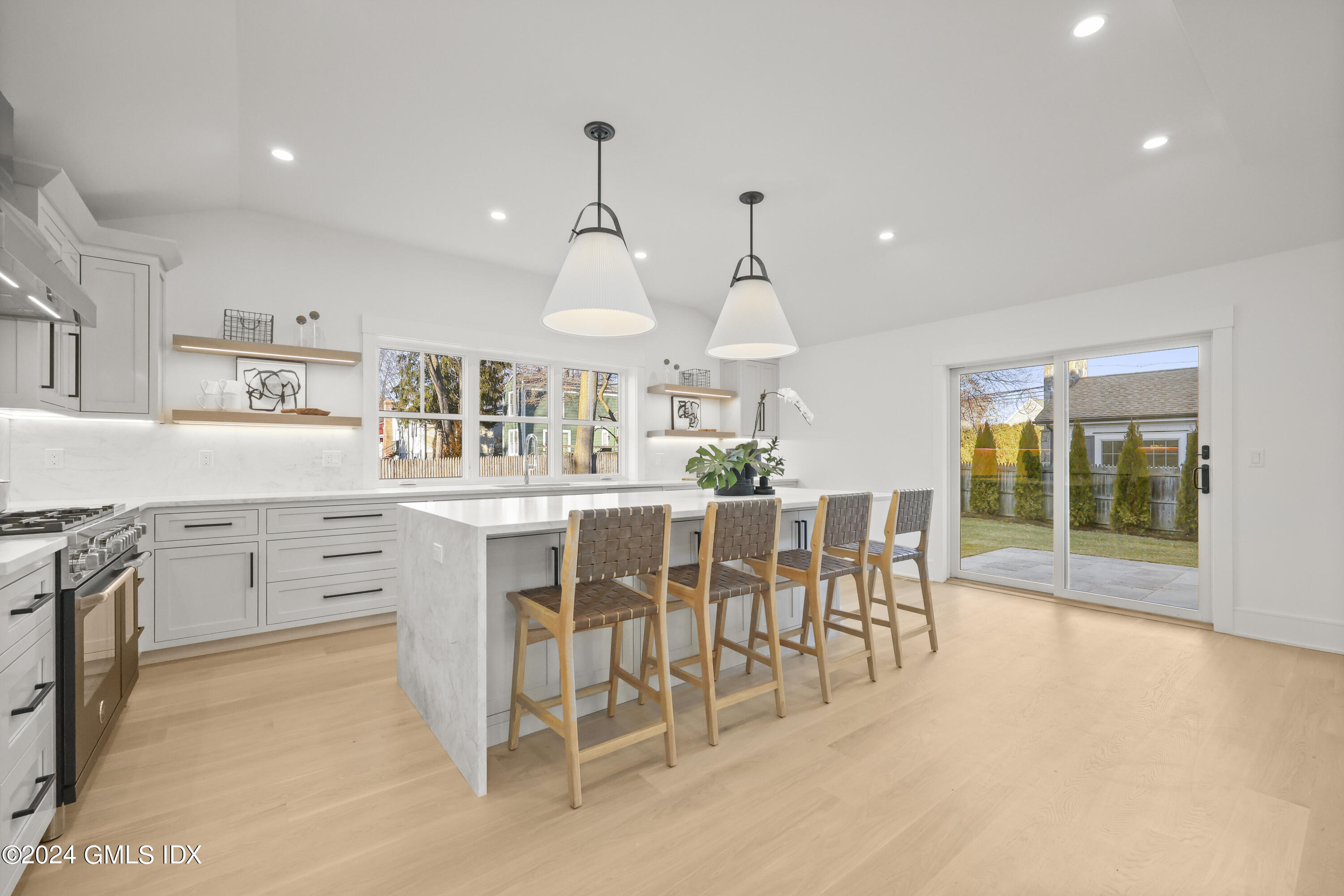 5 Northridge Road Old Greenwich, CT 06870 - Photo 5 of 32 a kitchen with counter top space cabinets and appliances