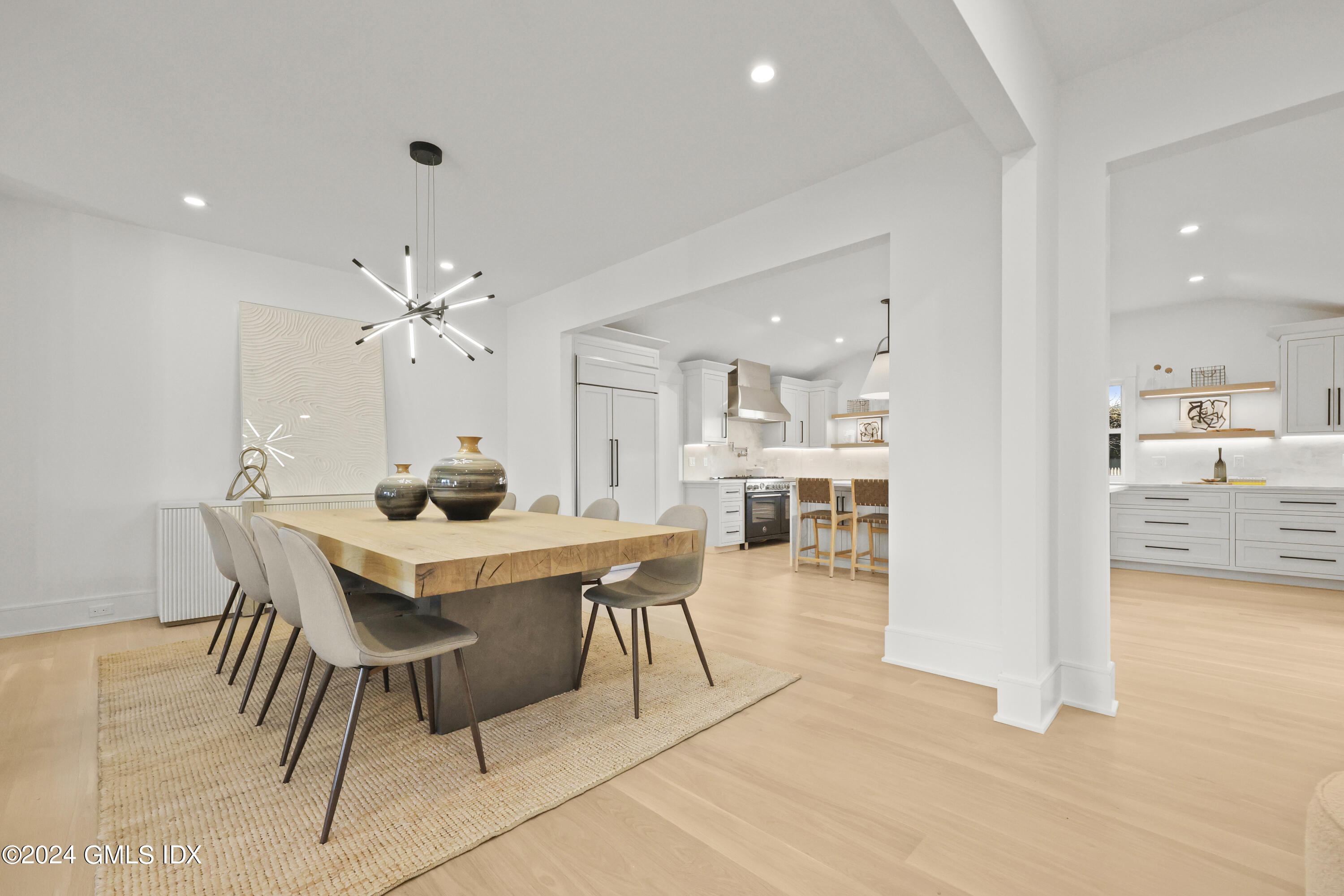 5 Northridge Road Old Greenwich, CT 06870 - Photo 10 of 32 a view of a dining room with furniture and wooden floor
