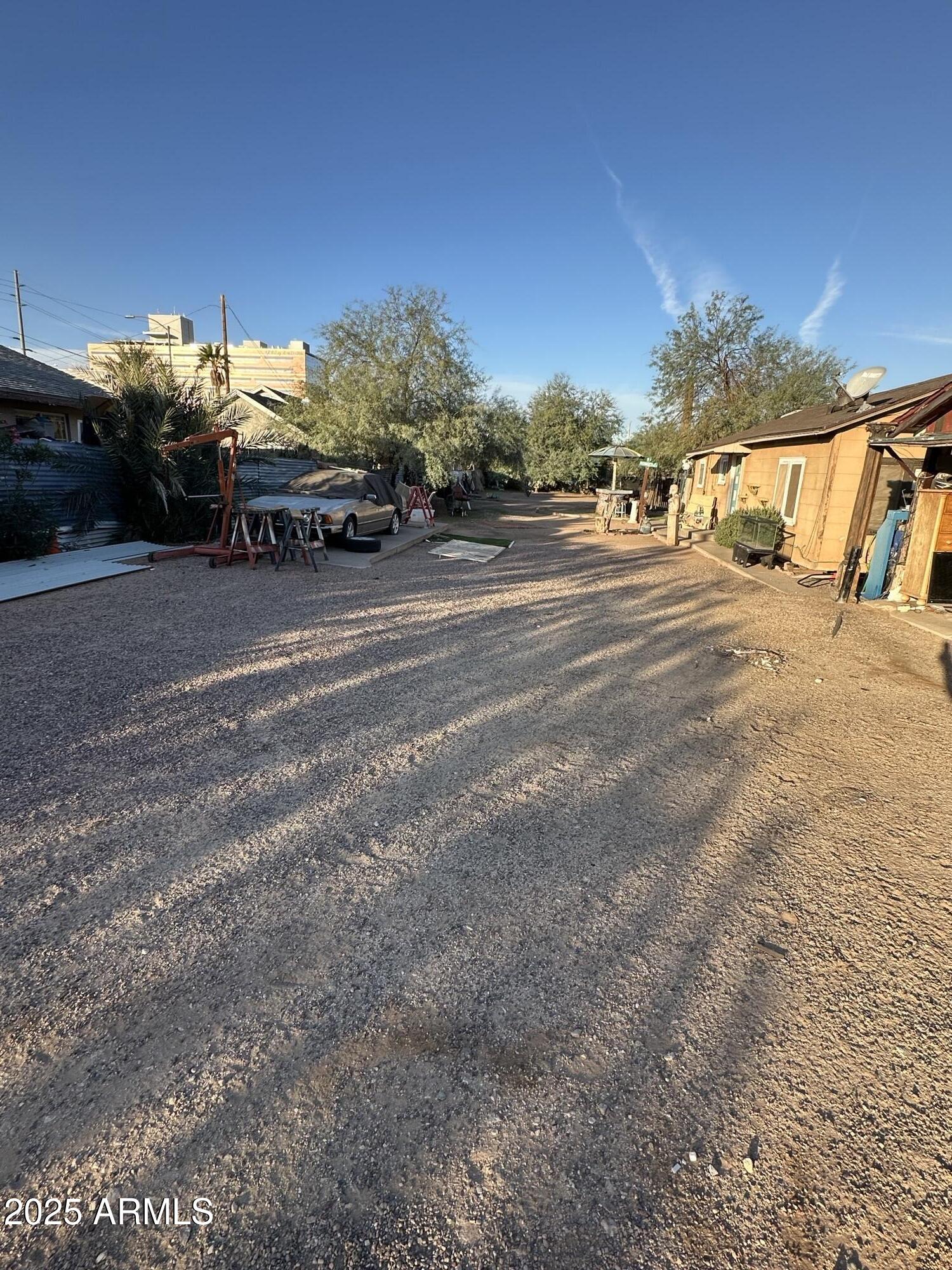 1008 North 27th Street Phoenix, AZ 85008 - Photo 11 of 15 a view of road with large trees
