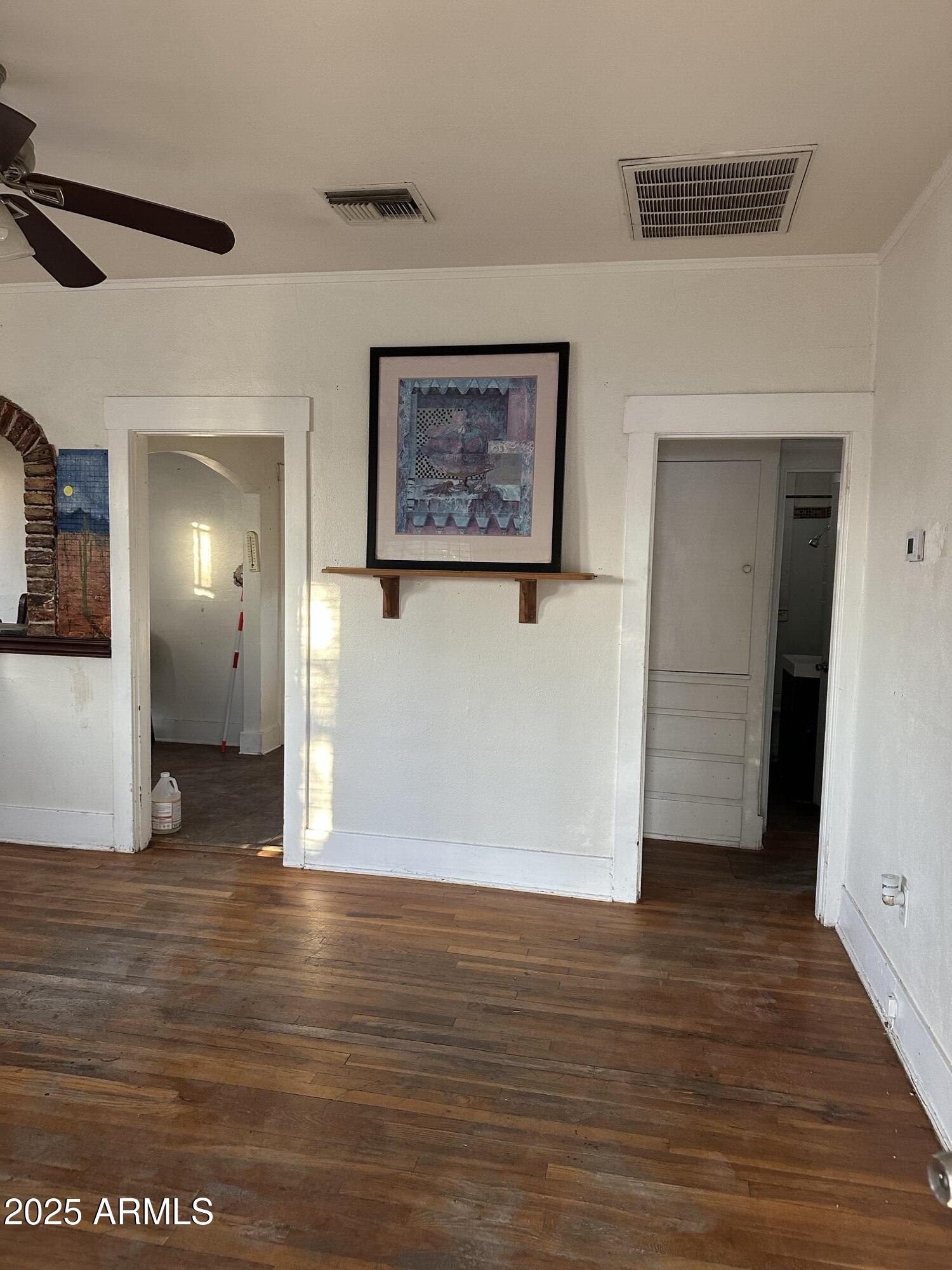 1008 North 27th Street Phoenix, AZ 85008 - Photo 4 of 15 a view of a room with wooden floor