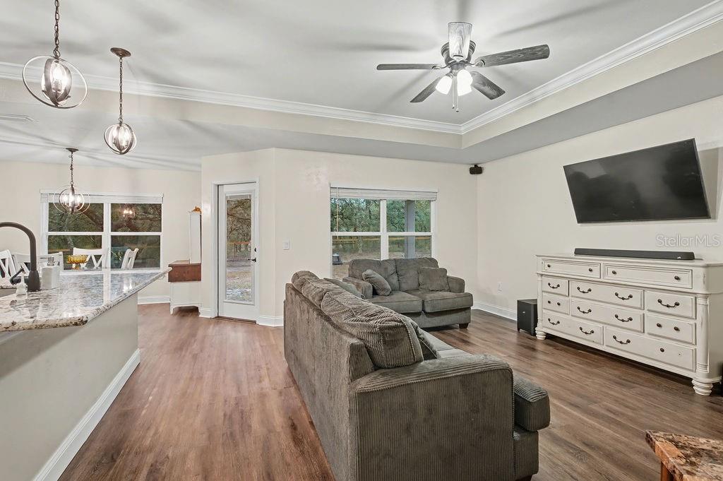 8291 Northeast 118th Terrace Bronson, FL 32621 - Photo 14 of 25 a living room with furniture and a flat screen tv