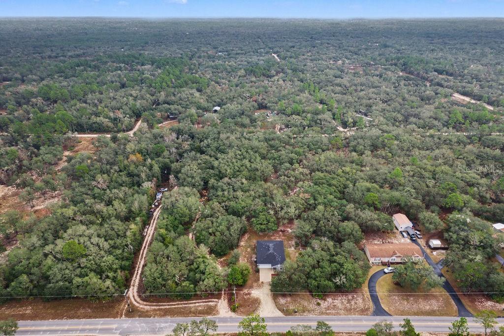 8291 Northeast 118th Terrace Bronson, FL 32621 - Photo 25 of 25 an aerial view of house with yard