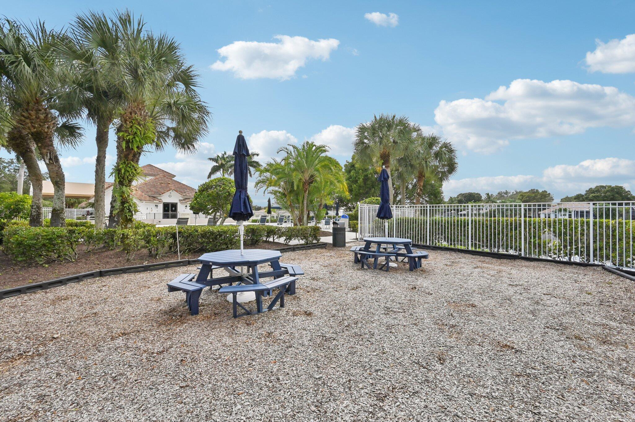 231 Sparrow Point Jupiter, FL 33458 - Photo 54 of 65 a view of a park with iron fence
