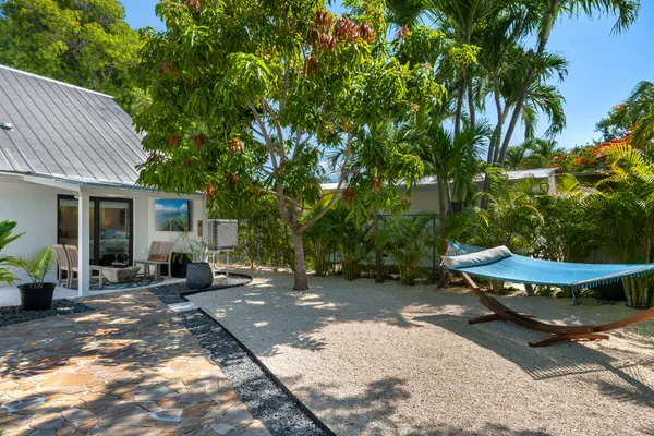 a en suite bathroom with a double sink and mirror