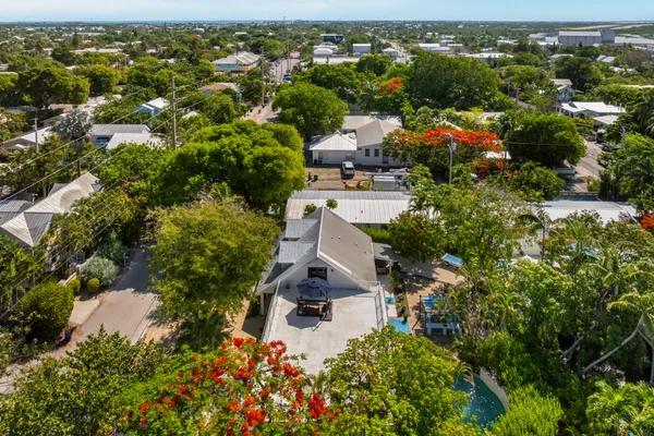 an aerial view of residential house with parking space
