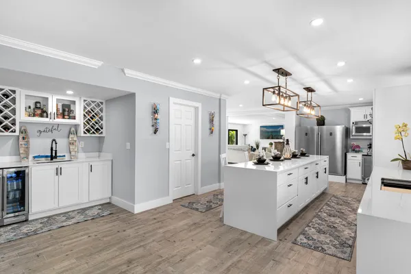 a view of living room and kitchen