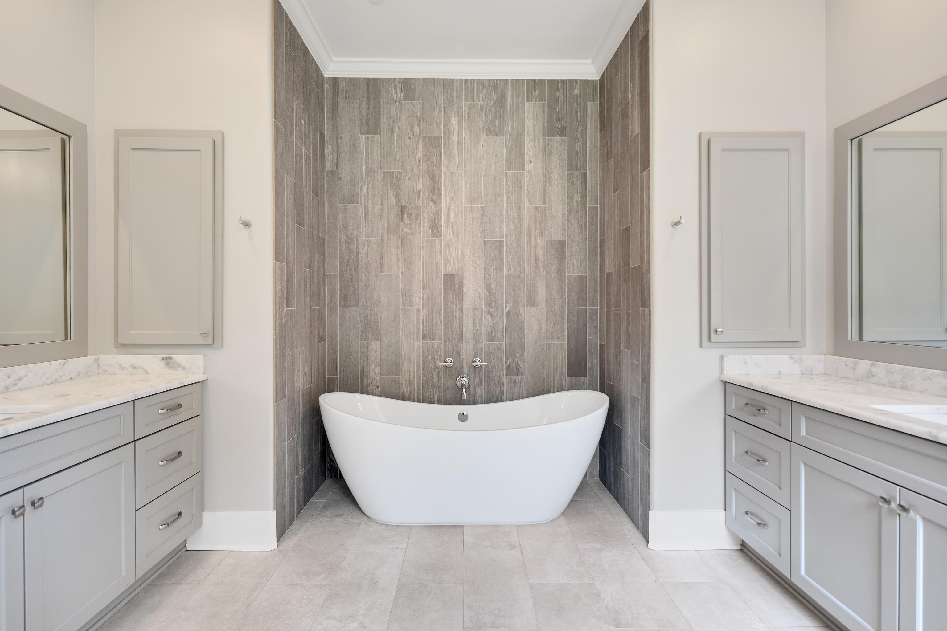 55 East Old State Line Road Piperton, TN 38017 - Photo 23 of 40 Freestanding tub alcove with wood-look tile accent wall