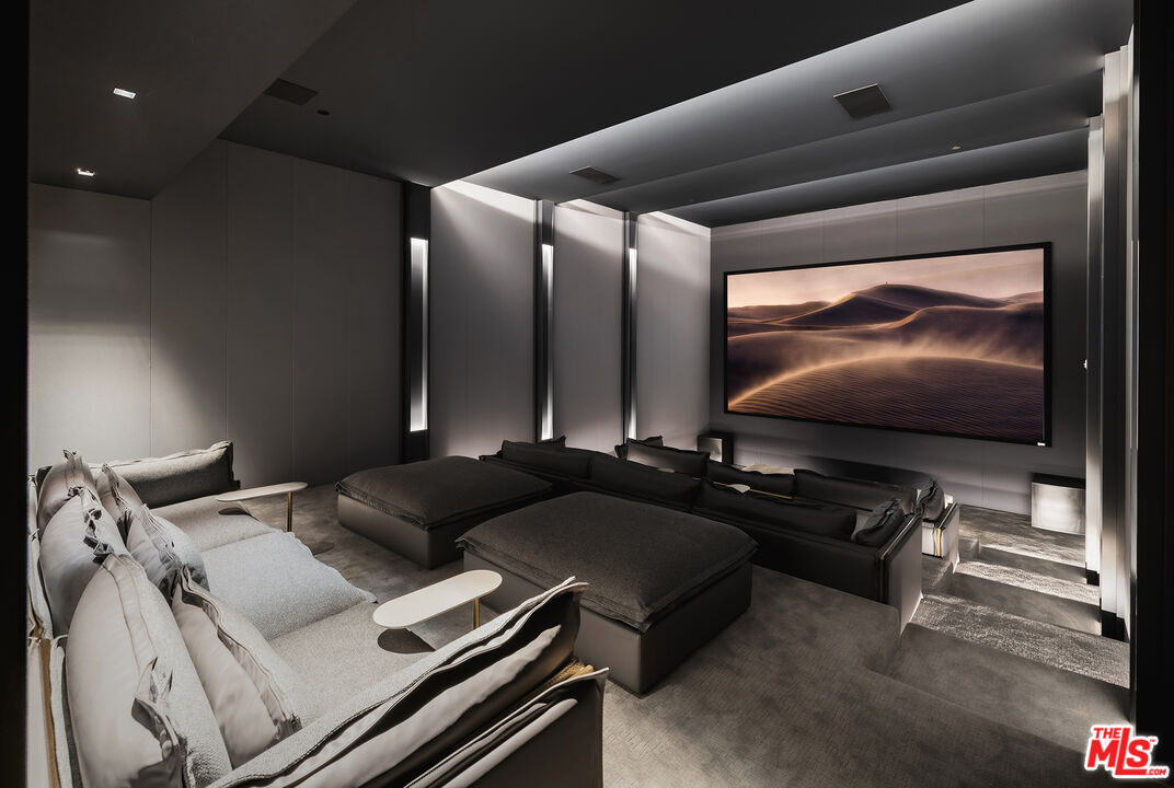 1108 Wallace Ridge Beverly Hills, CA 90210 - Photo 50 of 74 a living room with furniture and a flat screen tv