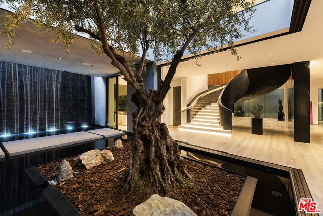 a view of a hallway with entryway