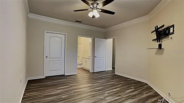 a view of a livingroom with wooden floor