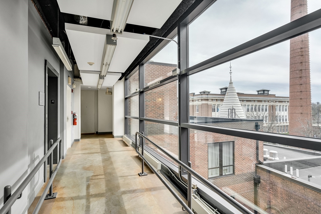 251 Heath Street, Unit 421 Boston, MA 02130 - Photo 15 of 20 a view of an entryway with a floor to ceiling window
