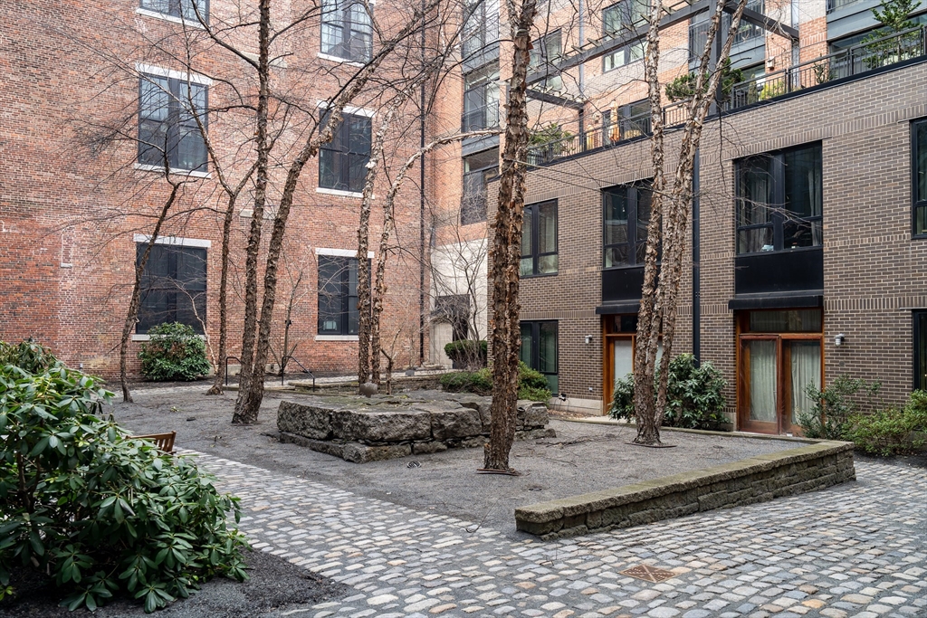 251 Heath Street, Unit 421 Boston, MA 02130 - Photo 16 of 20 a view of a building with street view