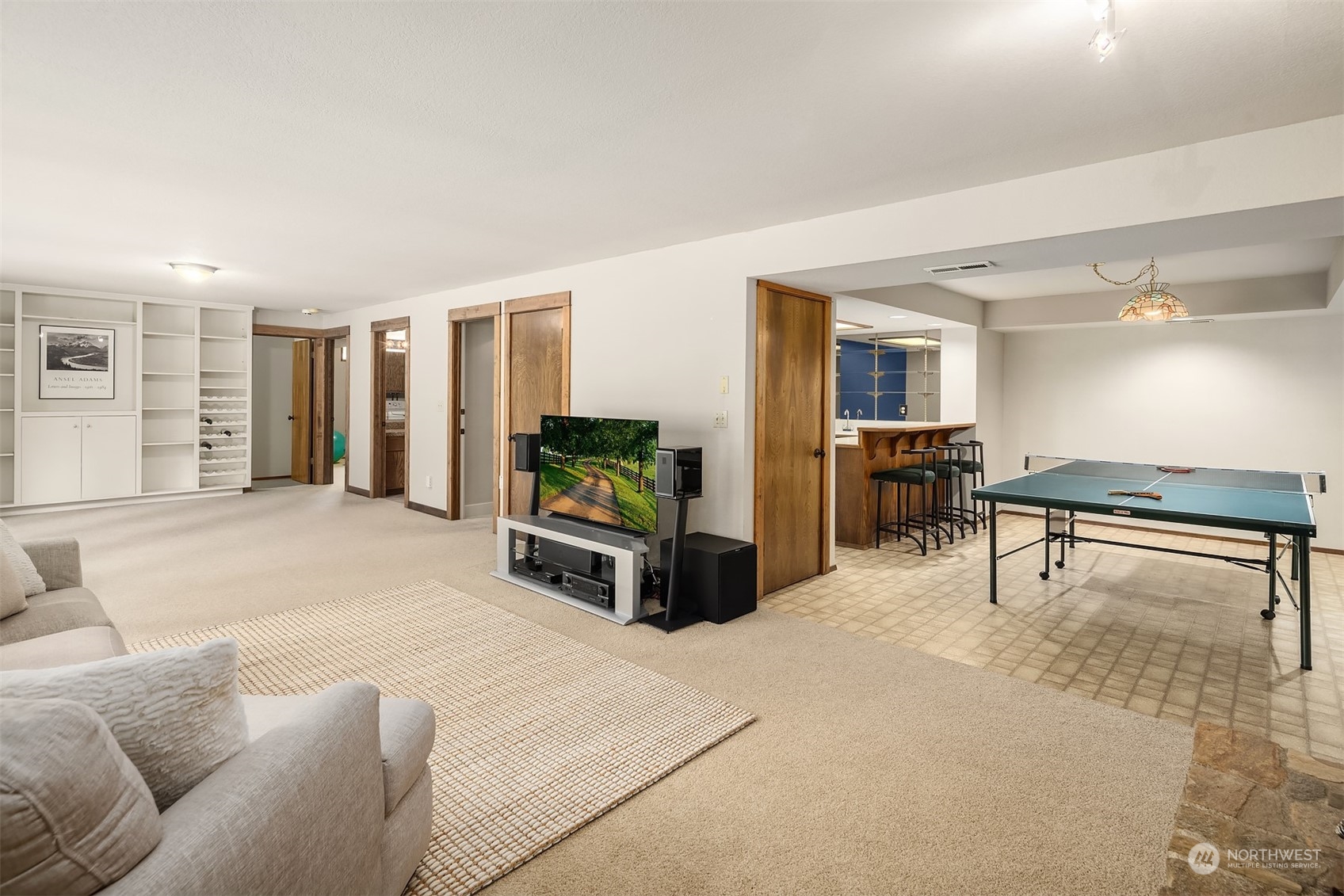 3905 108th Street Southeast Everett, WA 98208 - Photo 17 of 28 a living room with furniture and a wooden floor