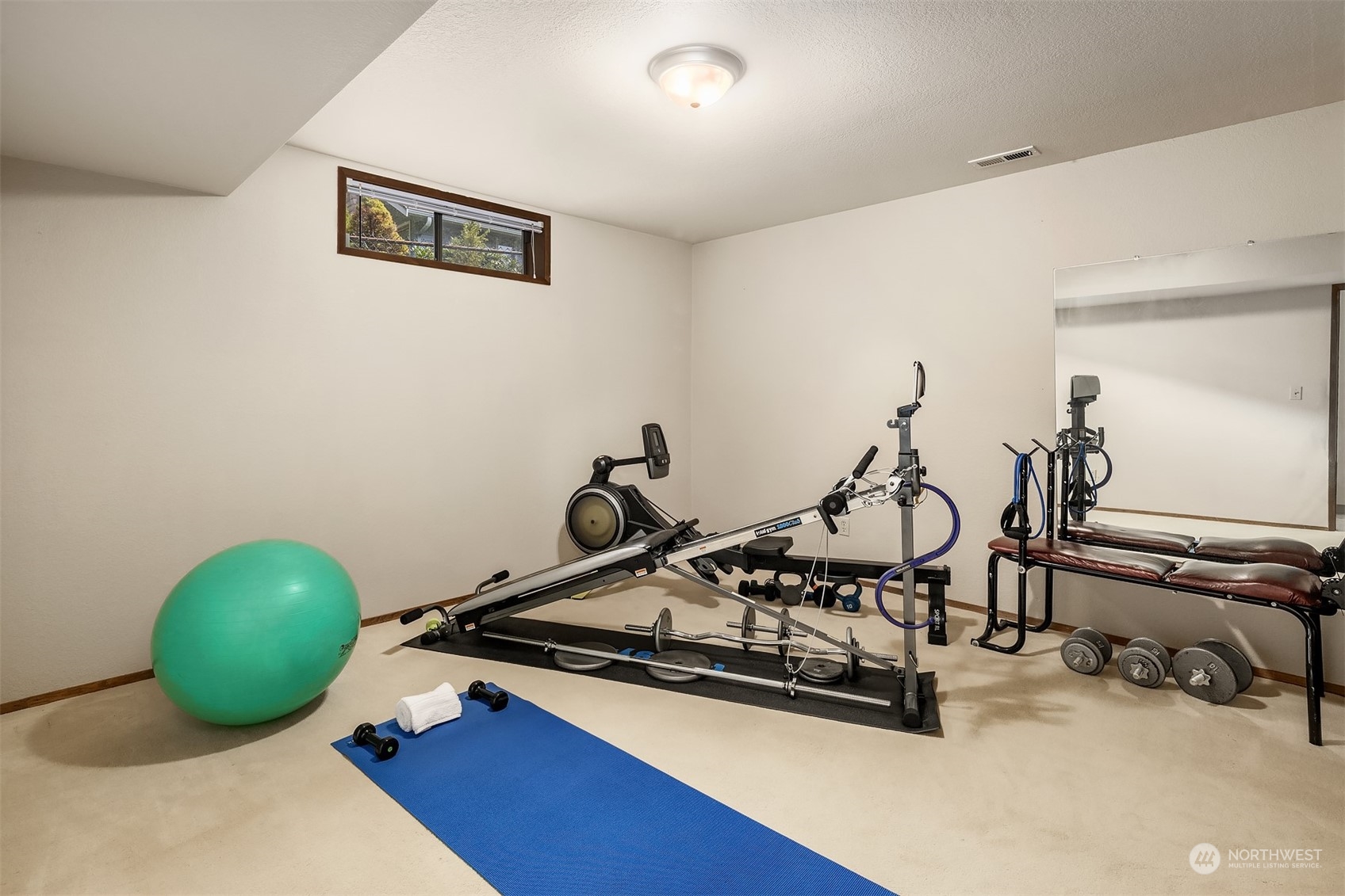 3905 108th Street Southeast Everett, WA 98208 - Photo 19 of 28 a room with gym equipment