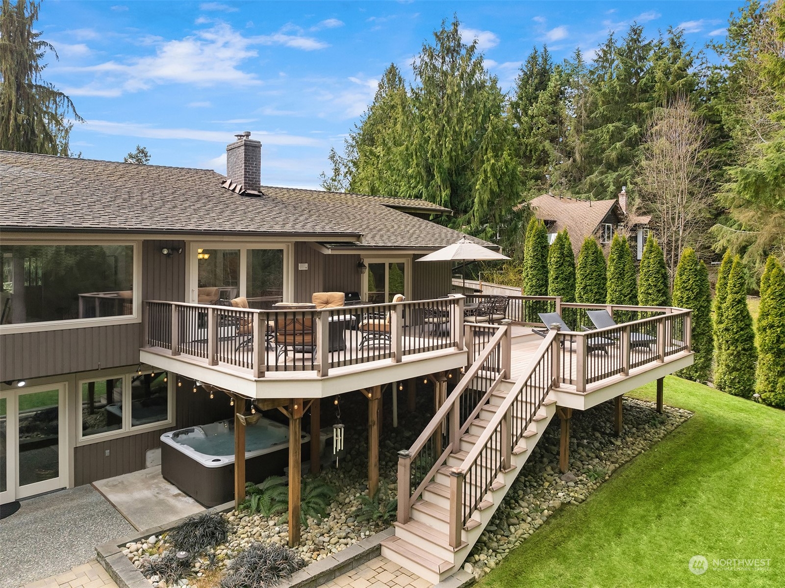 3905 108th Street Southeast Everett, WA 98208 - Photo 21 of 28 a view of a house with backyard porch and sitting area