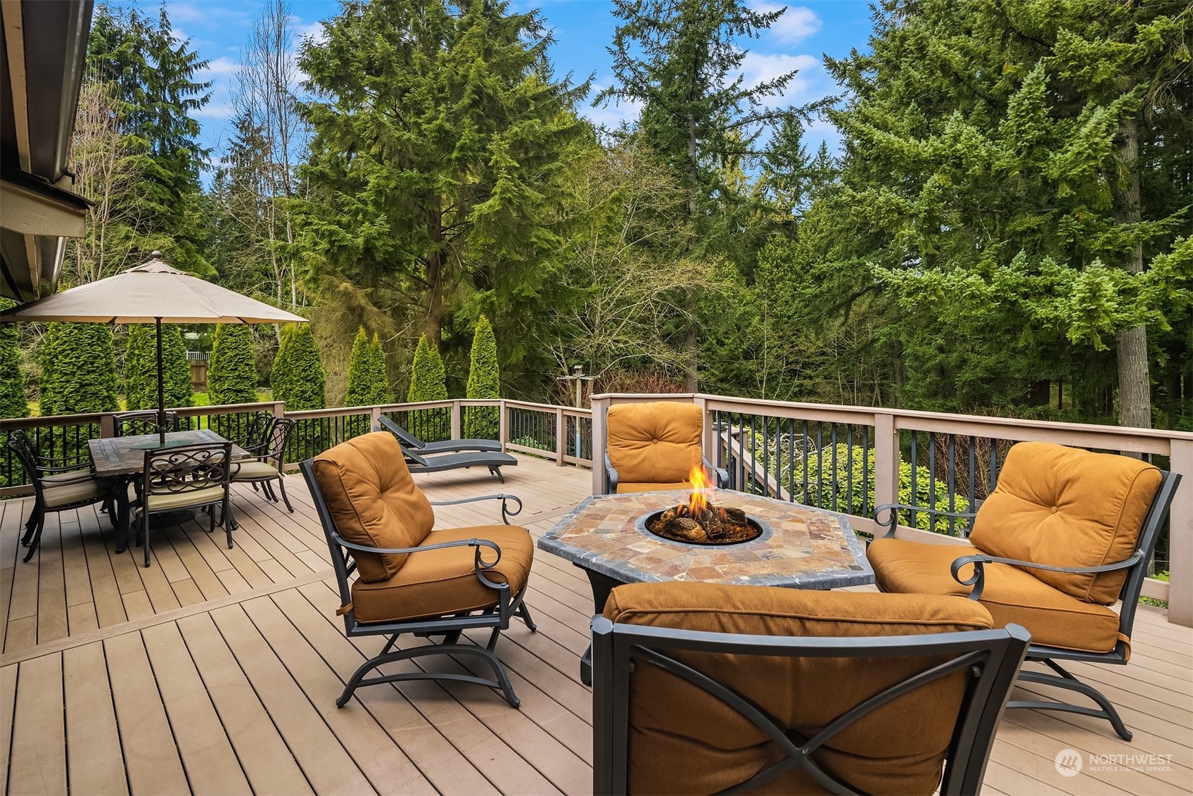 3905 108th Street Southeast Everett, WA 98208 - Photo 22 of 28 a view of chair and tables on the deck