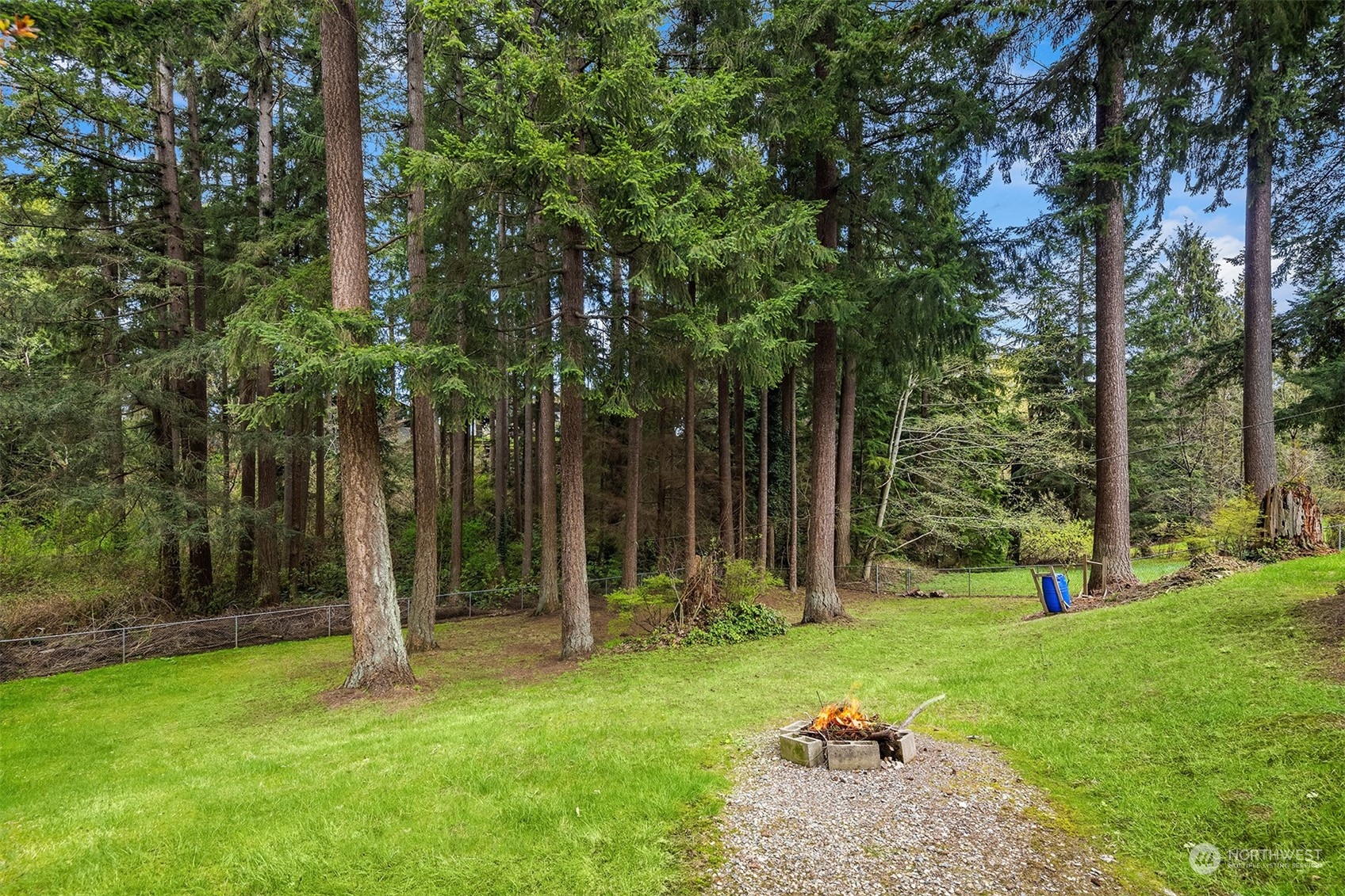 3905 108th Street Southeast Everett, WA 98208 - Photo 23 of 28 a view of a backyard with a fountain