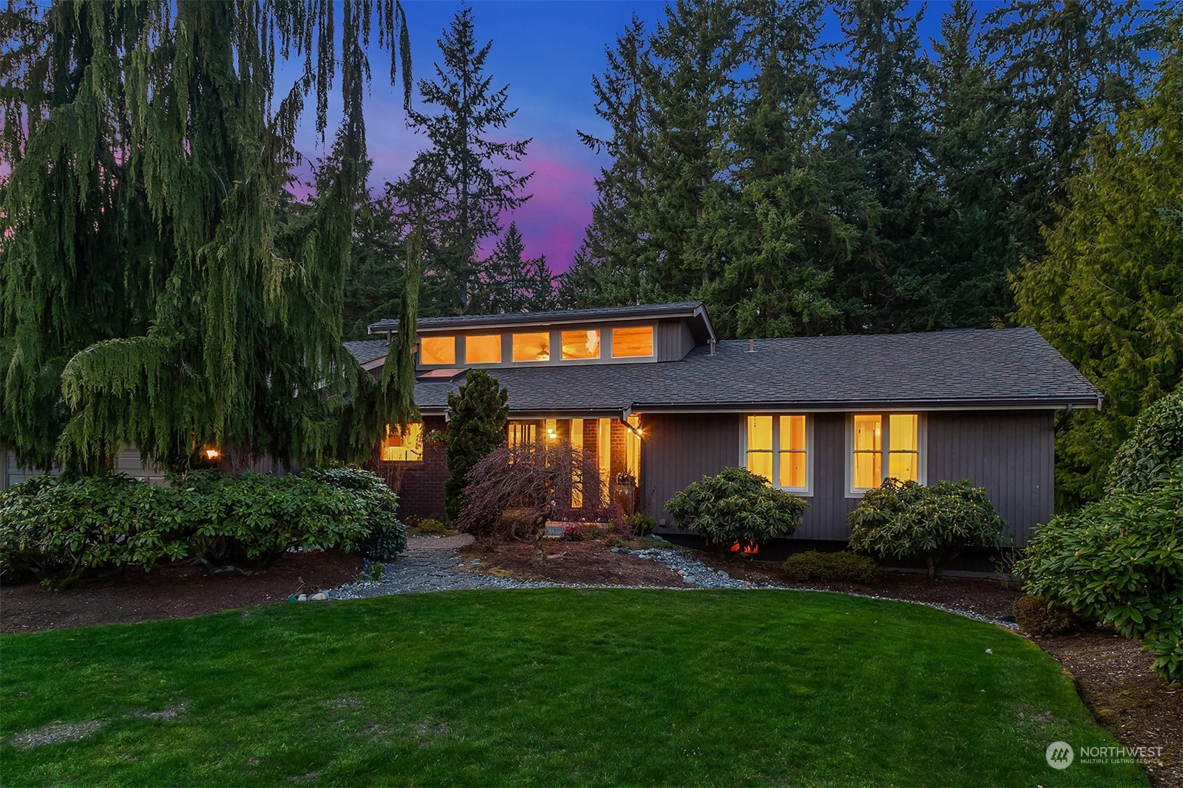 3905 108th Street Southeast Everett, WA 98208 - Photo 25 of 28 a sign that is sitting in front of a house with a small yard