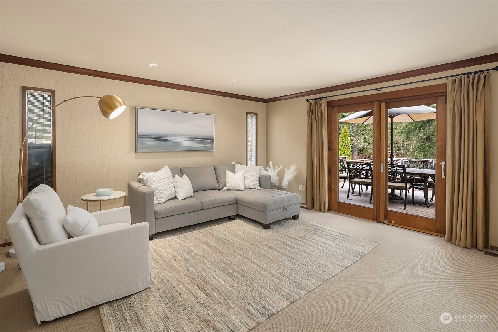 3905 108th Street Southeast Everett, WA 98208 - Photo 9 of 28 a living room with furniture and a floor to ceiling window