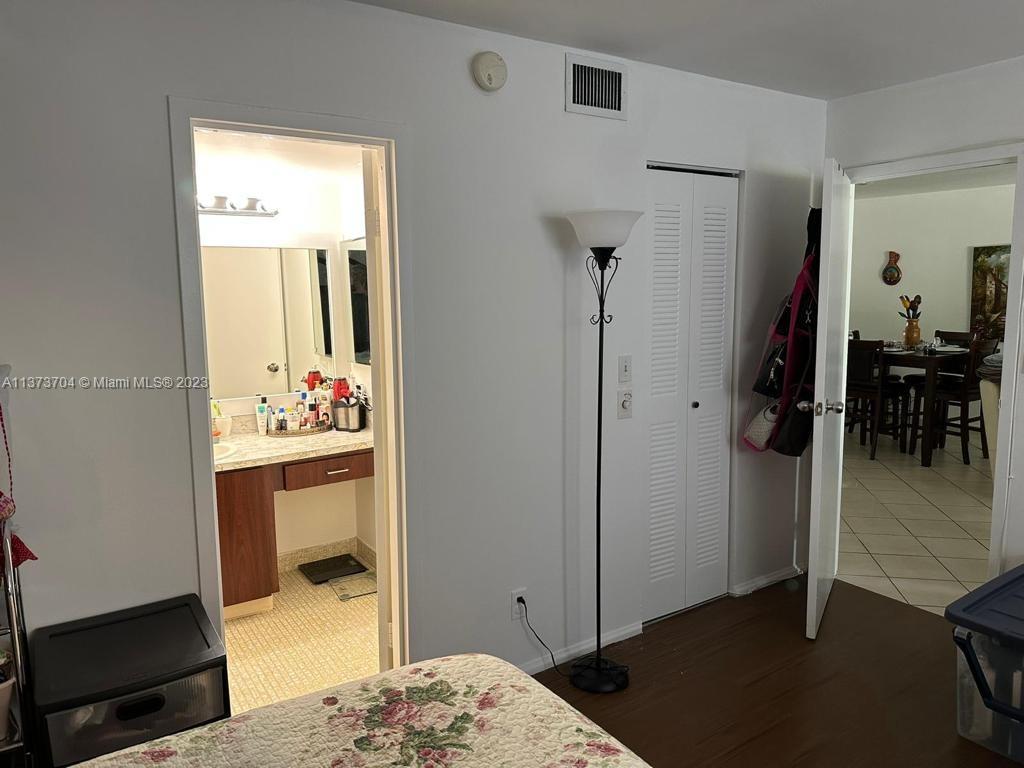 a bedroom with a bed and furniture