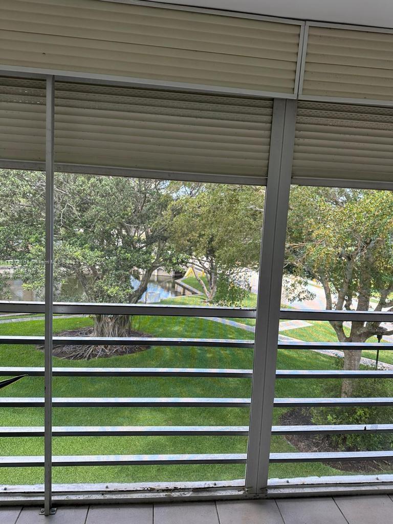 8340 Sands Point Boulevard, Unit P309 Tamarac, FL 33321 - Photo 6 of 33 a view of outdoor space with a window