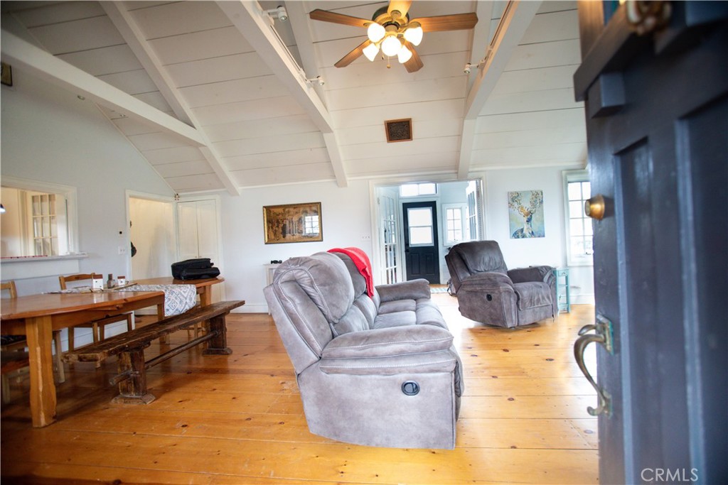 5963 Schilling Road Coulterville, CA 95311 - Photo 12 of 75 a living room with furniture and a chandelier