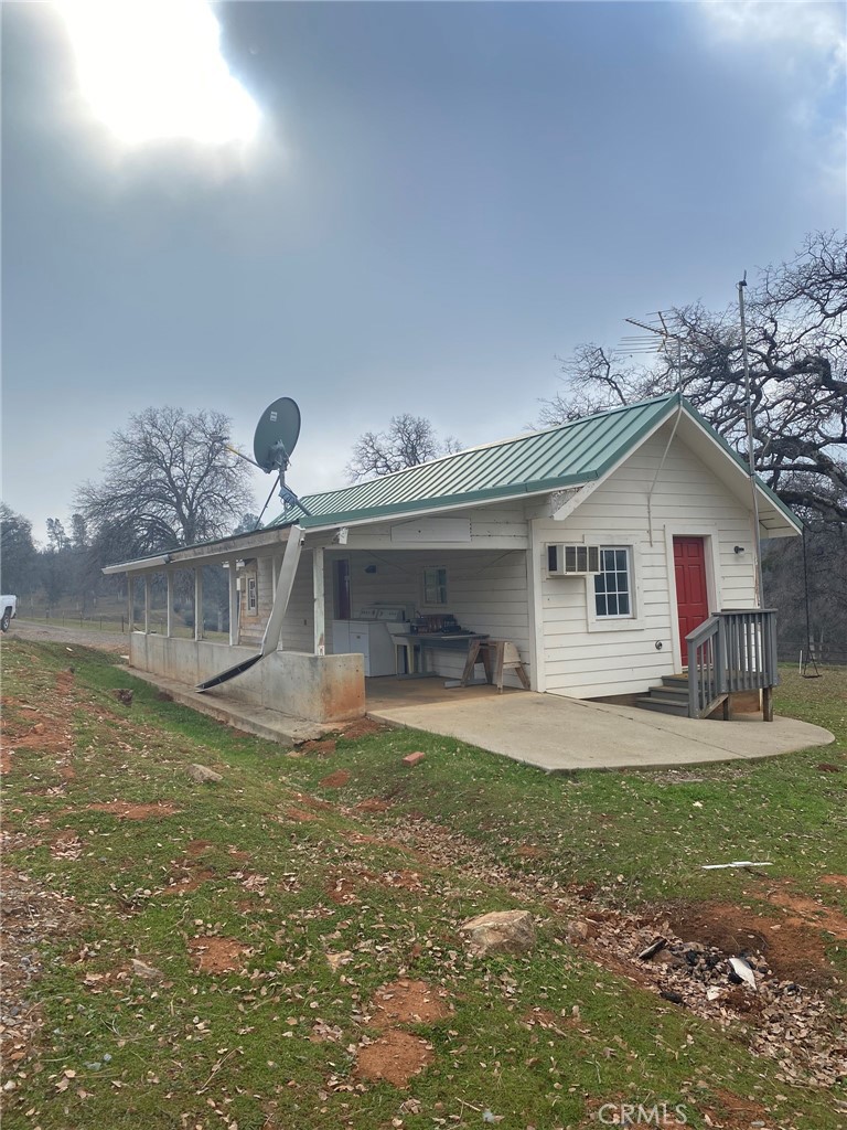 5963 Schilling Road Coulterville, CA 95311 - Photo 30 of 75 a view of a house with a yard and sitting area